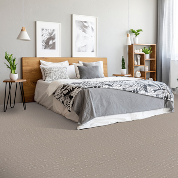 beige texture carpet in bedroom